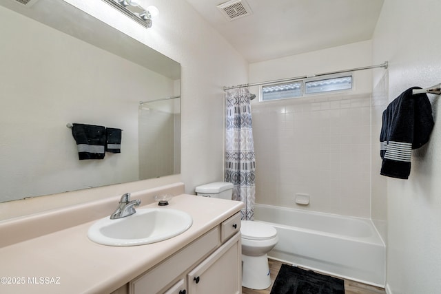 full bathroom featuring visible vents, toilet, shower / bath combo, and vanity