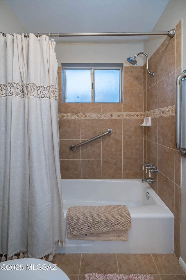 bathroom with shower / tub combo and tile patterned flooring