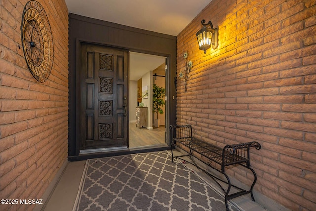 entrance to property featuring covered porch