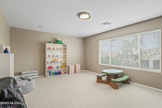 game room with carpet, visible vents, and baseboards