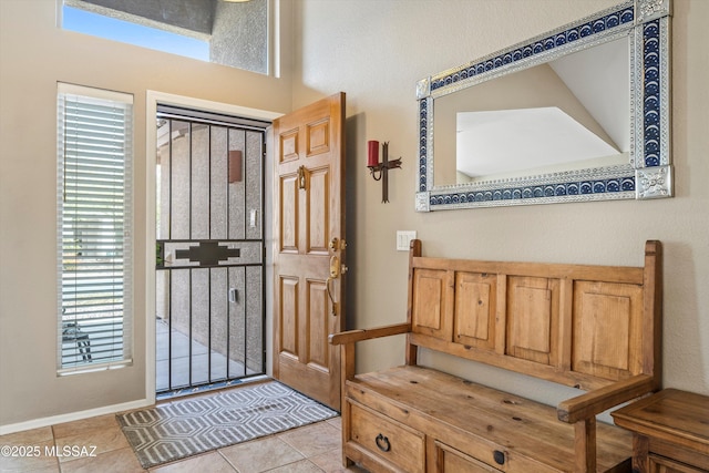 foyer with light tile patterned floors