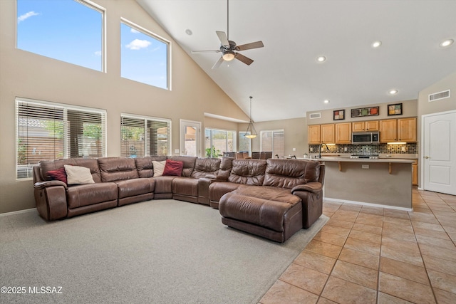 living room with recessed lighting, visible vents, ceiling fan, and light tile patterned floors