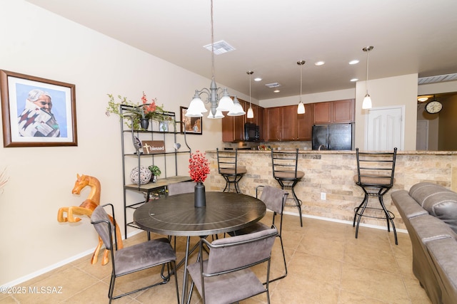 dining room with light tile patterned flooring, recessed lighting, a notable chandelier, visible vents, and baseboards