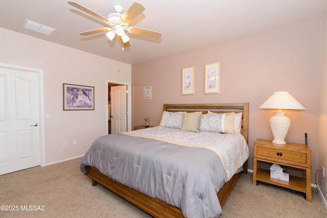 bedroom with a ceiling fan, baseboards, visible vents, and carpet flooring