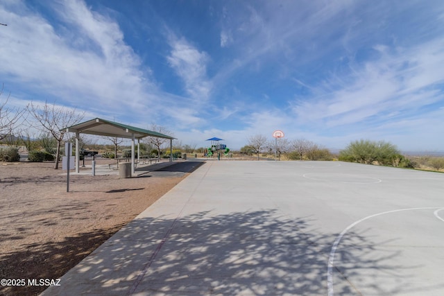 exterior space featuring community basketball court