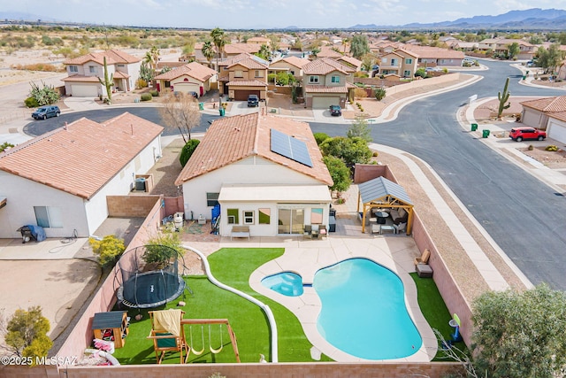 bird's eye view featuring a residential view and a mountain view