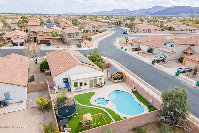 birds eye view of property featuring a residential view and a mountain view