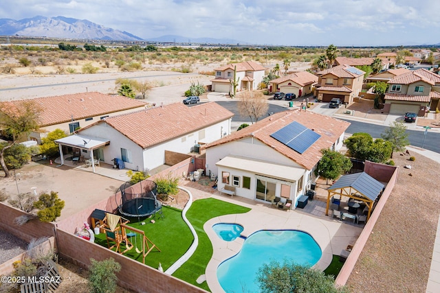 aerial view featuring a residential view and a mountain view