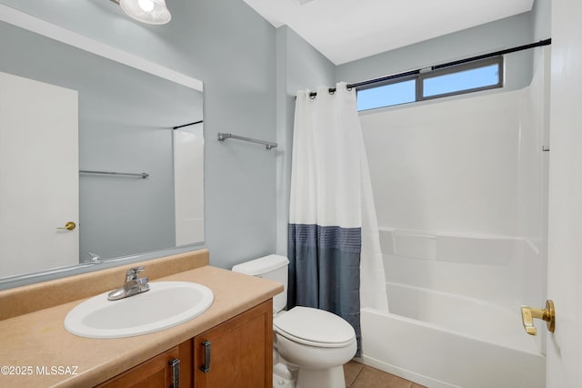 bathroom with shower / tub combo with curtain, vanity, toilet, and tile patterned floors