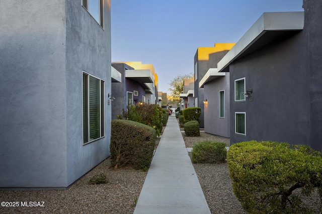 view of property exterior featuring a residential view and stucco siding