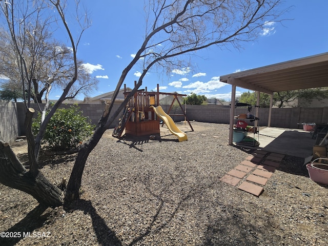 1702 E Saint Bernadine St, Tucson, AZ 85713 - view of jungle gym with a fenced backyard and a patio