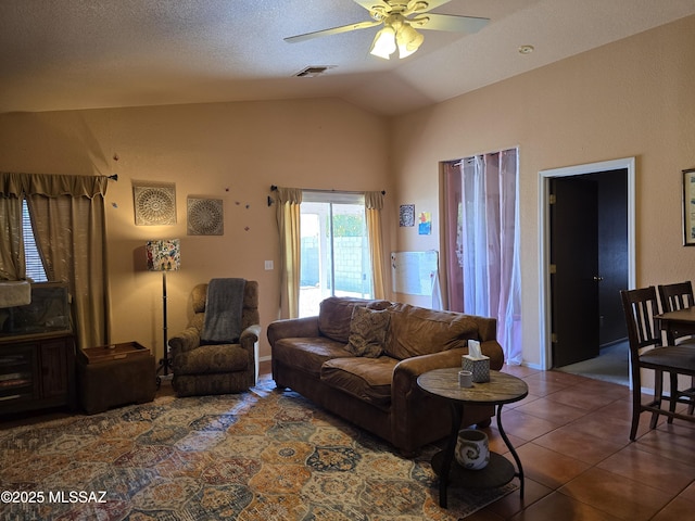 1702 E Saint Bernadine St, Tucson, AZ 85713 - living room with a ceiling fan, lofted ceiling, and tile patterned flooring