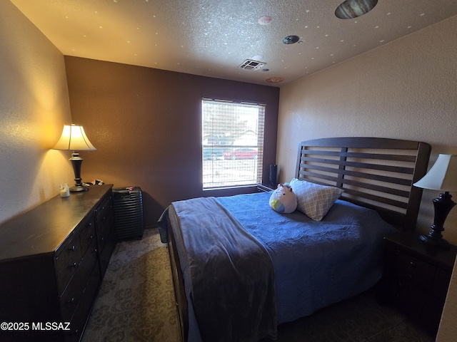 1702 E Saint Bernadine St, Tucson, AZ 85713 - bedroom featuring carpet and a textured ceiling