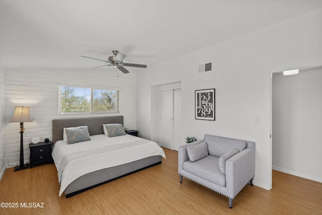 6530 N Camino De La Karina, Tucson, AZ 85718 - bedroom with wood finished floors, a closet, and ceiling fan