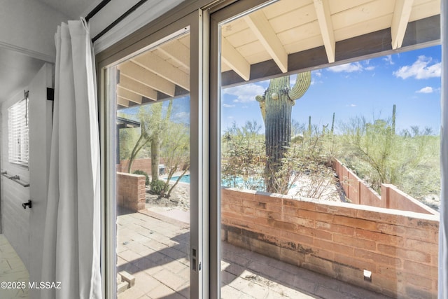 6530 N Camino De La Karina, Tucson, AZ 85718 - doorway to outside with beam ceiling