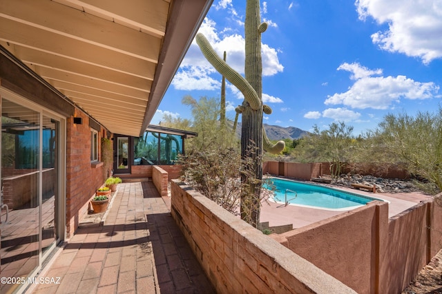6530 N Camino De La Karina, Tucson, AZ 85718 - view of pool featuring a patio area, a fenced backyard, and a mountain view