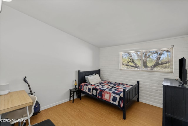6530 N Camino De La Karina, Tucson, AZ 85718 - bedroom featuring wood finished floors and baseboards