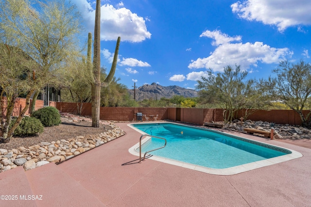 6530 N Camino De La Karina, Tucson, AZ 85718 - view of pool featuring a mountain view, a fenced backyard, and a patio