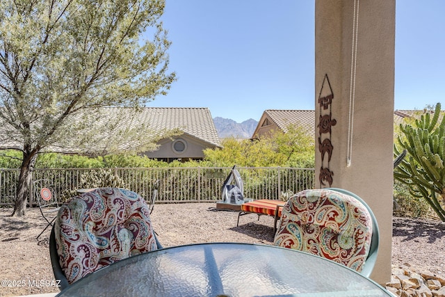 view of patio / terrace featuring outdoor dining space and fence