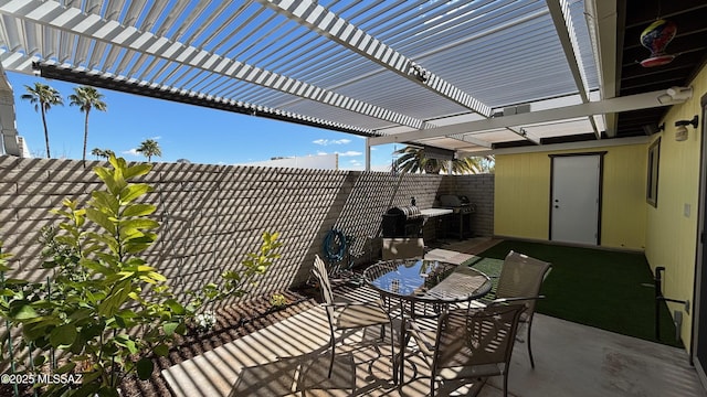 view of patio / terrace featuring area for grilling, a pergola, outdoor dining area, and a fenced backyard