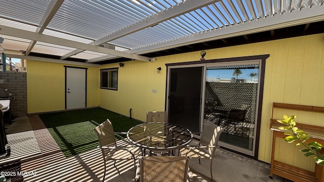 view of patio / terrace featuring outdoor dining area and a pergola