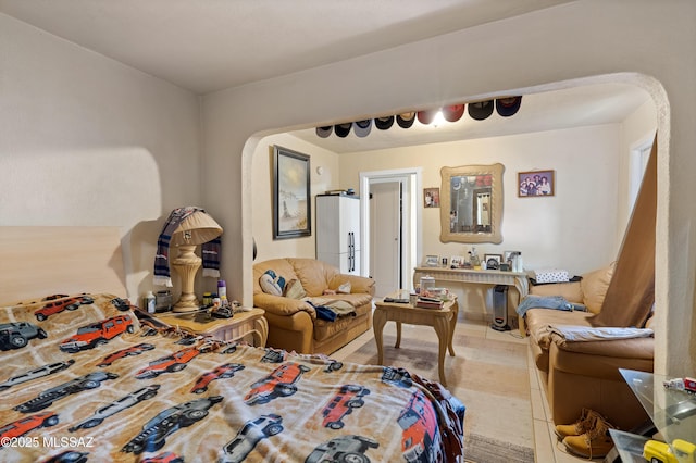 bedroom with arched walkways