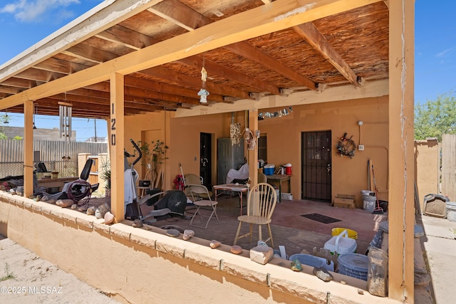 view of patio / terrace with fence