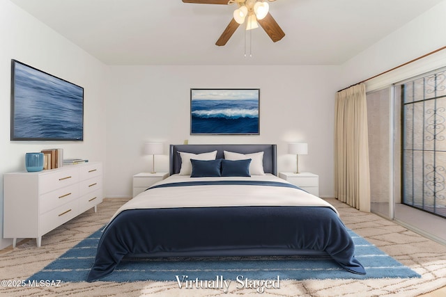 bedroom with light colored carpet and ceiling fan