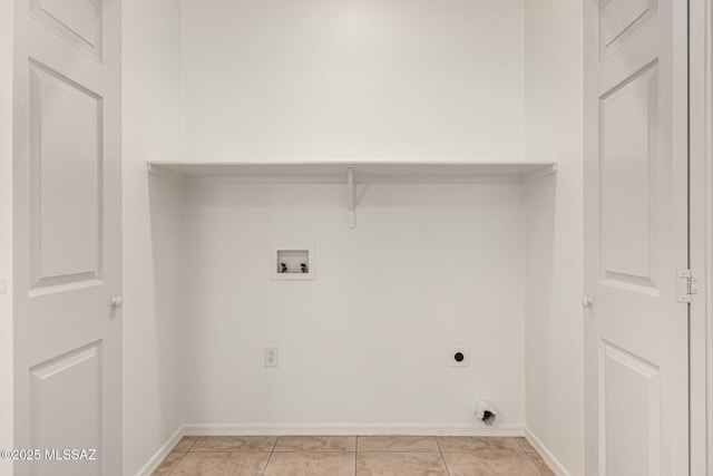 clothes washing area with baseboards, hookup for an electric dryer, washer hookup, and light tile patterned floors
