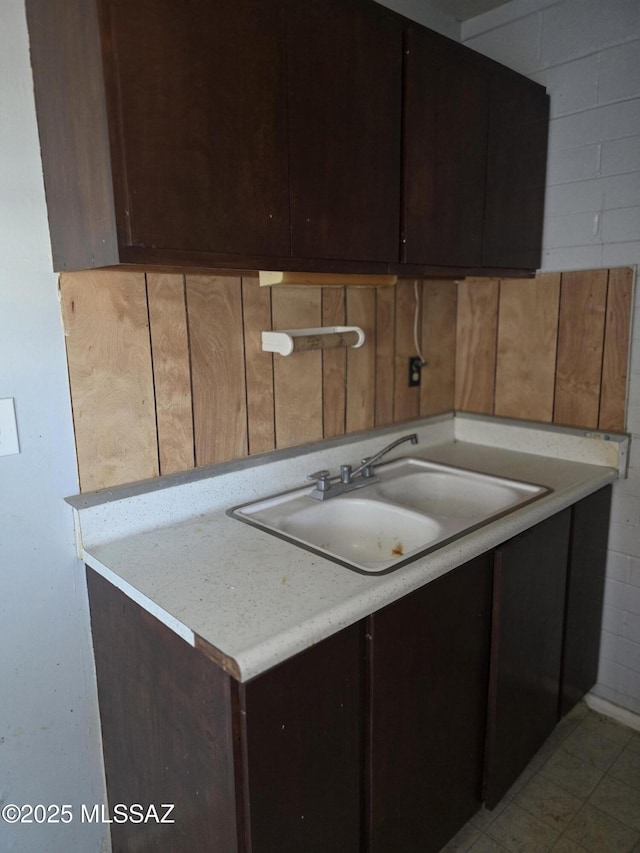 kitchen with light countertops and a sink