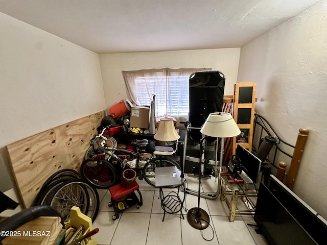 rec room with tile patterned floors