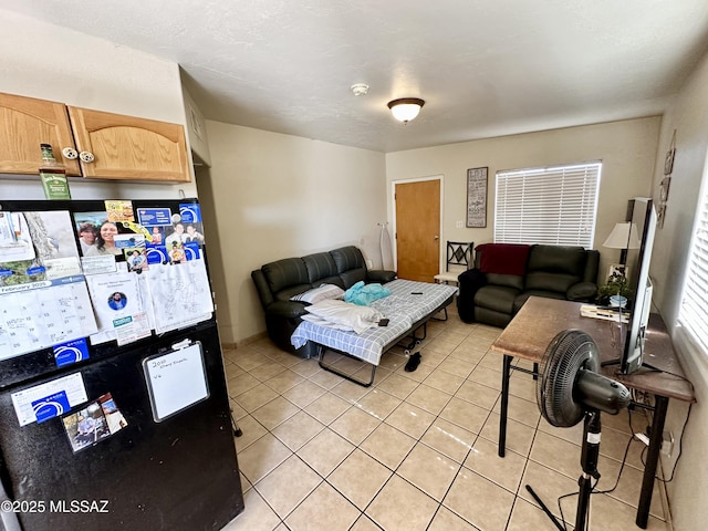 living room with light tile patterned floors