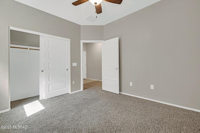 unfurnished bedroom with carpet, a closet, visible vents, and baseboards