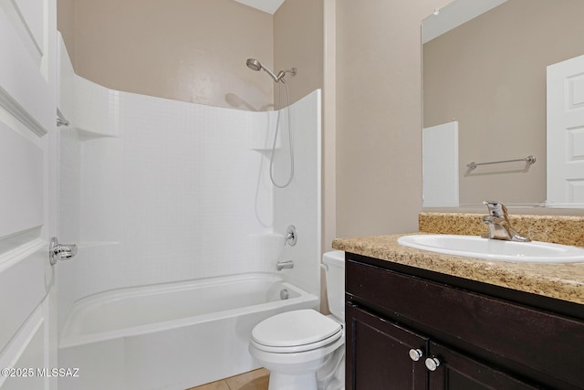 bathroom with  shower combination, tile patterned flooring, vanity, and toilet