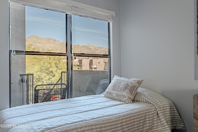 bedroom with a mountain view