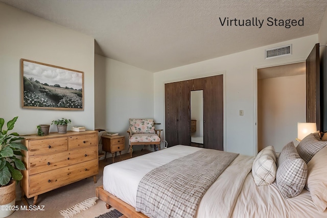 bedroom with visible vents