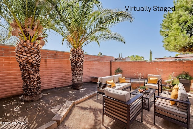 view of patio / terrace with a fenced backyard and an outdoor hangout area