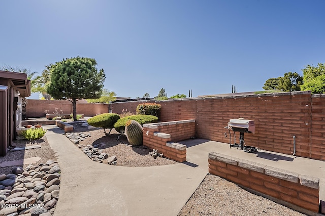 view of yard with a fenced backyard