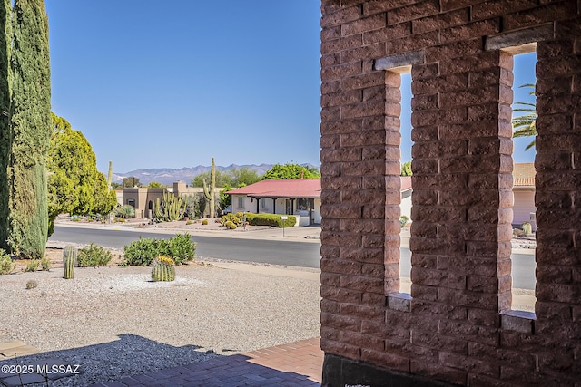 exterior space featuring a mountain view