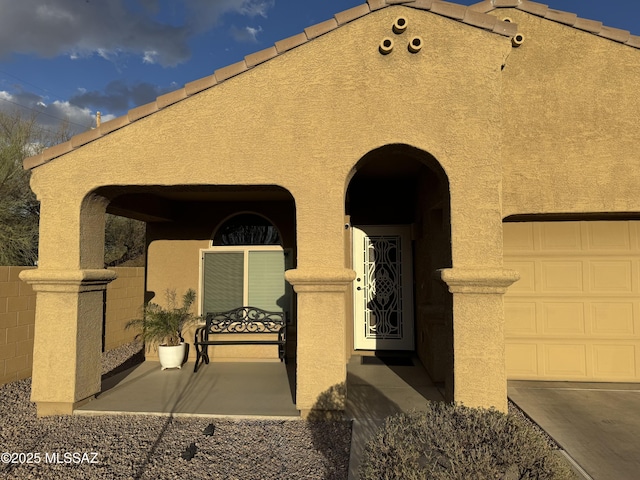 view of front of house featuring stucco siding