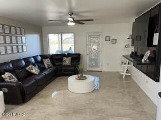 living room with a ceiling fan