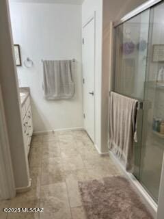 bathroom featuring a stall shower