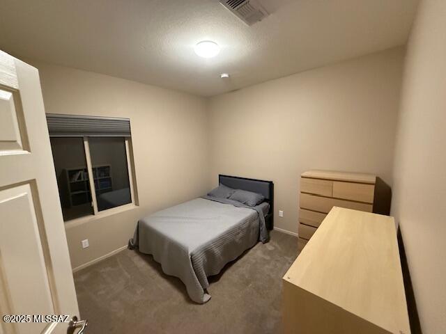 bedroom featuring carpet and visible vents