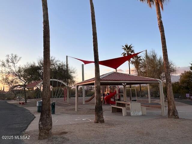 view of property's community featuring playground community