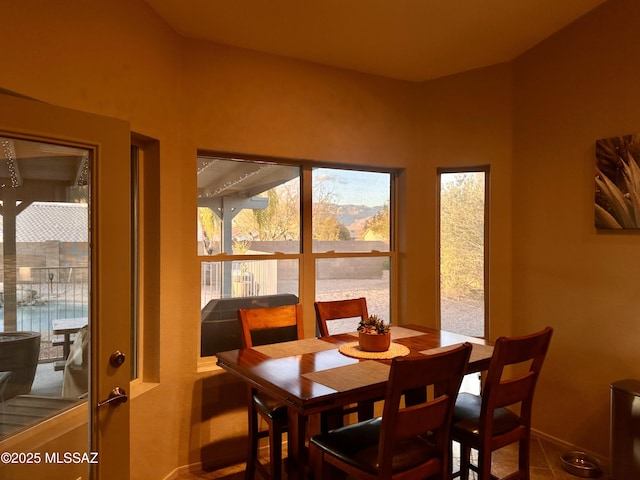 dining room with baseboards