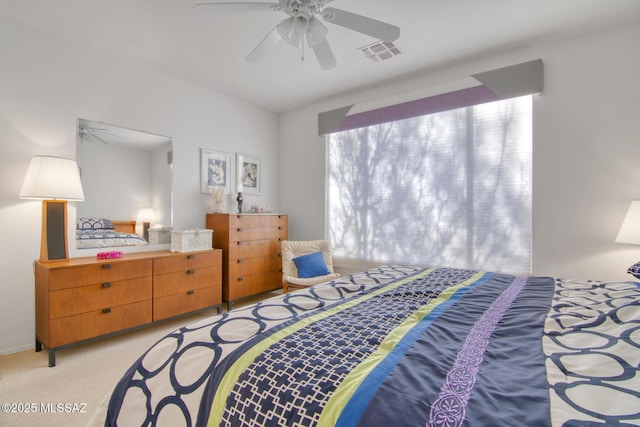 4621 S Pinnacle Peak Dr, Green Valley, AZ 85622 - bedroom featuring light carpet, a ceiling fan, and baseboards