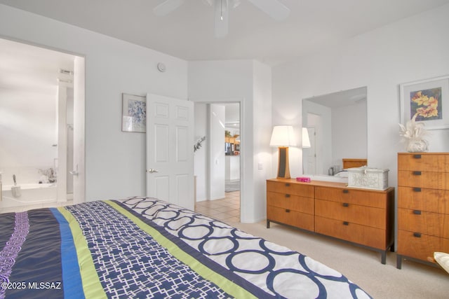 4621 S Pinnacle Peak Dr, Green Valley, AZ 85622 - bedroom featuring ensuite bathroom, light tile patterned floors, and a ceiling fan