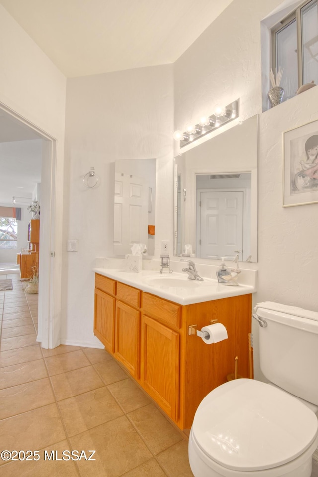 4621 S Pinnacle Peak Dr, Green Valley, AZ 85622 - bathroom featuring toilet, tile patterned flooring, and vanity