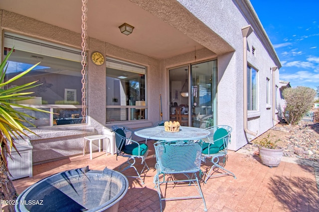 4621 S Pinnacle Peak Dr, Green Valley, AZ 85622 - view of patio featuring outdoor dining area
