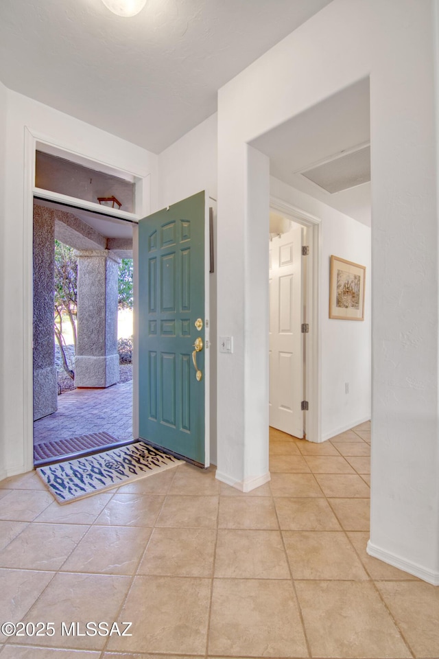 4621 S Pinnacle Peak Dr, Green Valley, AZ 85622 - foyer with tile patterned flooring and baseboards